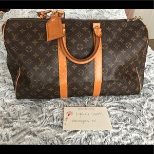 Louis Vuitton Keepall 45 monogram with luggage tag
